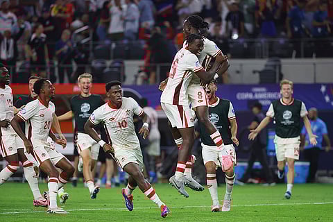 Ismael Kone celebrates after making the winning penalty kick against Venezuela